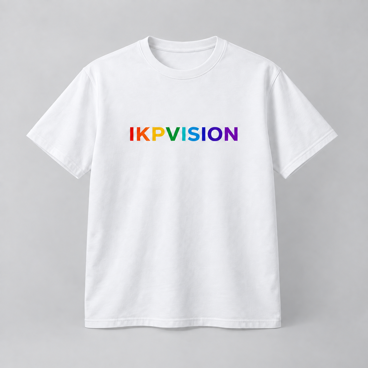 Concept mockup of a white IKPVISION T-shirt with a rainbow chest wordmark